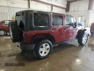 2008 Jeep Wrangler Unlimited Sahara z VIN 1J4GA59198L570409, wystawiony jako Copart lot #58853295 z przebiegiem 84 502 mil mil oraz Nie do naprawy • Non repairable. Historia ofert i sprzedaży dostępna na DreamBid. Obrazek 3.