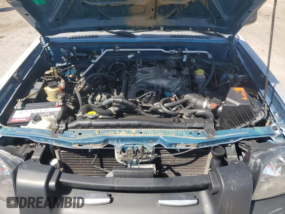 2003 Nissan Frontier XE with VIN 1N6ED27T23C456197, listed as a Copart auction lot 57393515 with 181,596 mi miles and Salvage title. Bid and sale history available at DreamBid. Image 11.