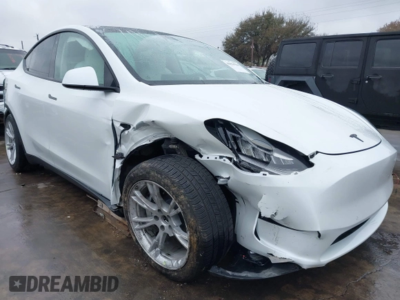 2022 Tesla Model Y Long Range with VIN 7SAYGDEE3NF380067, listed as a IAAI auction lot 41016704 with 52,180 mi miles and . Bid and sale history available at DreamBid. Image 6.