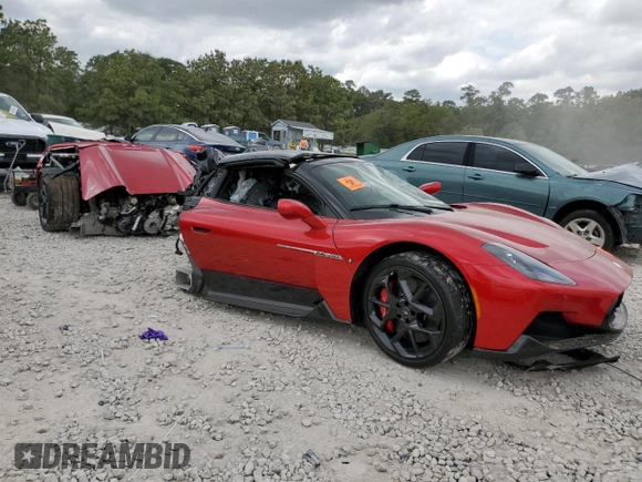 2023 Maserati MC20 z VIN ZAMBMSAB6P0443249, wystawiony jako Copart lot #46668944 z przebiegiem Nie podano mil oraz Nie do naprawy • Non repairable. Historia ofert i sprzedaży dostępna na DreamBid. Obrazek 4.