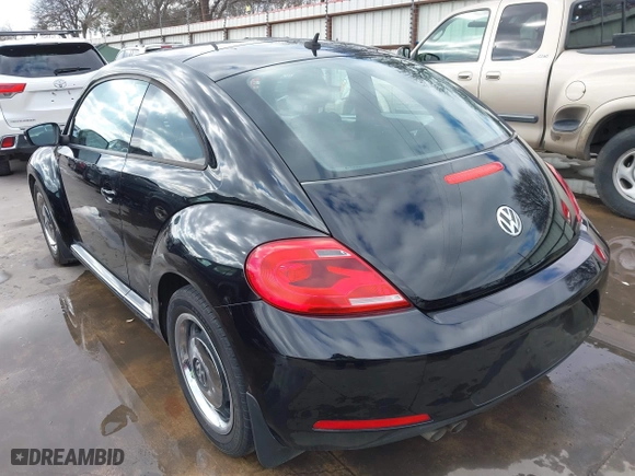 2012 Volkswagen Beetle 2.5L w/Sun/Sound/Nav PZEV with VIN 3VWHP7AT0CM623536, listed as a IAAI auction lot 41351333 with 106,600 mi miles. Bid and sale history available at carsss.com. Image 3.