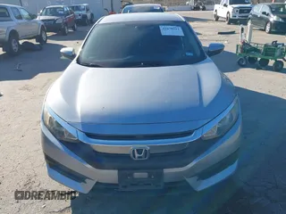 2016 Honda Civic Sedan LX with VIN 19XFC2F50GE027409, listed as a IAAI auction lot 41678211 with 116,498 mi miles. Bid and sale history available at carsss.com. Image 12.