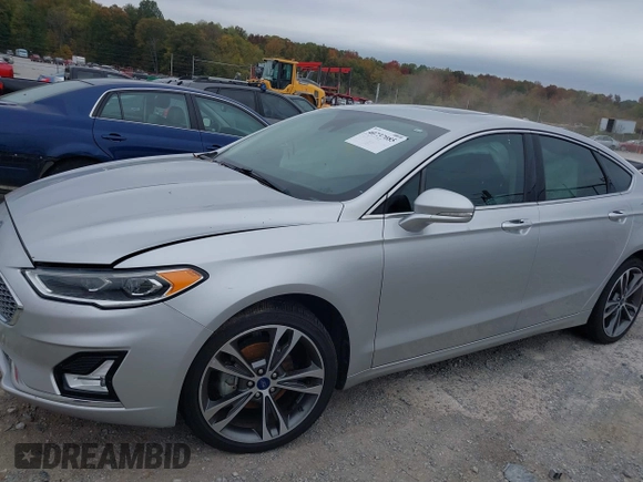 2019 Ford Fusion Titanium with VIN 3FA6P0K96KR120749, listed as a IAAI auction lot 40737085 with 118,376 mi miles and . Bid and sale history available at DreamBid. Image 2.