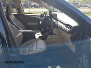 2020 Ford Escape SE Sport Hybrid with VIN 1FMCU9BZ6LUC38008, listed as a IAAI auction lot 42143784 with 81,804 mi miles and . Bid and sale history available at DreamBid. Image 5.