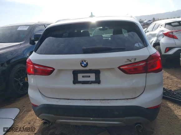 2018 BMW X1 sDrive28i with VIN WBXHU7C32J5H41587, listed as a IAAI auction lot 41538394 with 125,804 mi miles. Bid and sale history available at carsss.com. Image 17.