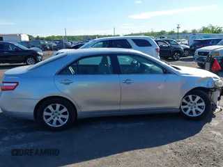 2007 Toyota Camry LE z VIN JTNBK46K473003622, wystawiony jako IAAI lot #42286264 z przebiegiem 105 630 mil mil oraz . Historia ofert i sprzedaży dostępna na DreamBid. Obrazek 14.