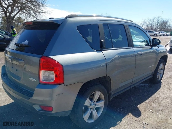2012 Jeep Compass Latitude with VIN 1C4NJDEB6CD562986, listed as a IAAI auction lot 41813858 with 144,068 mi miles. Bid and sale history available at carsss.com. Image 4.