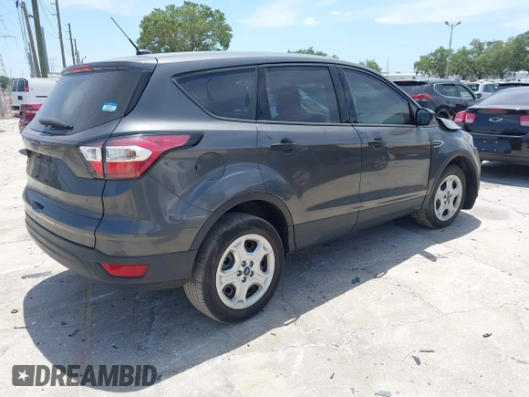 2018 Ford Escape S with VIN 1FMCU0F7XJUA16377, listed as a IAAI auction lot 42080136 with 81,060 mi miles and . Bid and sale history available at carsss.com. Image 4.
