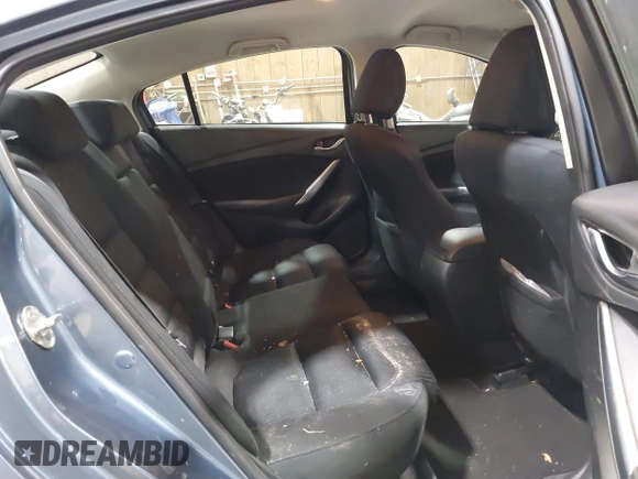 2014 Mazda 6 i Sport with VIN JM1GJ1U61E1148983, listed as a IAAI auction lot 41977553 with 100,668 mi miles and . Bid and sale history available at DreamBid. Image 8.