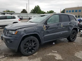 2018 Jeep Grand Cherokee Altitude with VIN 1C4RJFAG8JC289521, listed as a Copart auction lot 59312485 with 86,999 mi miles and Salvage title. Bid and sale history available at DreamBid. Image 1.