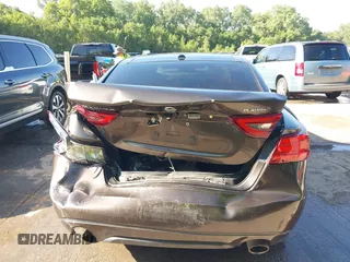 2016 Nissan Maxima Platinum z VIN 1N4AA6AP3GC385276, wystawiony jako IAAI lot #42547410 z przebiegiem 100 307 mil mil oraz . Historia ofert i sprzedaży dostępna na DreamBid. Obrazek 15.