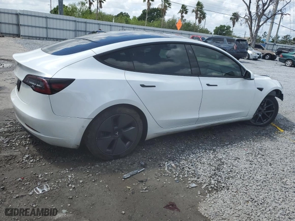 2021 Tesla Model 3 Standard Range Plus with VIN 5YJ3E1EA0MF920949, listed as a Copart auction lot 51477485 with 58,196 mi miles and Non Repairable. Bid and sale history available at carsss.com. Image 3.