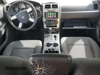 2009 Dodge Charger SE z VIN 2B3KA43D89H613585, wystawiony jako Copart lot #56076215 z przebiegiem 174 911 mil mil oraz Czysty tytuł • Clean title. Historia ofert i sprzedaży dostępna na DreamBid. Obrazek 8.