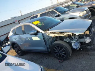 2018 Mazda CX-5 Touring with VIN JM3KFBCM6J0363767, listed as a IAAI auction lot 41776614 with 139,507 mi miles. Bid and sale history available at carsss.com. Image 13.