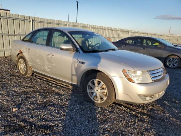 2009 Ford Taurus SEL with VIN 1FAHP24W79G103208, listed as a Copart auction lot 77621914 with 231,659 mi miles and Salvage Title. Bid and sale history available at carsss.com. Image 4.