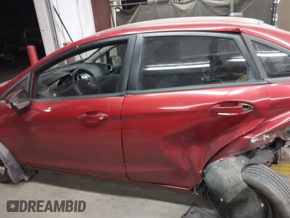 2013 Ford Fiesta SE z VIN 3FADP4BJ9DM167508, wystawiony jako IAAI lot #41696390 z przebiegiem Nie podano mil oraz . Historia ofert i sprzedaży dostępna na DreamBid. Obrazek 14.