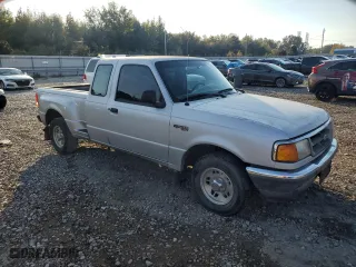 1997 Ford Ranger XL with VIN 1FTCR14A7VPA56690, listed as a Copart auction lot 77769694 with 299,529 mi miles and Salvage Title. Bid and sale history available at carsss.com. Image 4.
