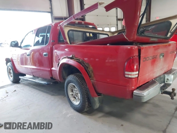2000 Dodge Dakota Sport z VIN 1B7GG2AN5YS793828, wystawiony jako IAAI lot #41955863 z przebiegiem 267 861 mil mil oraz . Historia ofert i sprzedaży dostępna na DreamBid. Obrazek 3.