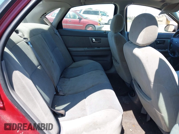 2002 Ford Taurus SE Standard with VIN 1FAFP53U92G230248, listed as a IAAI auction lot 42580676 with 122,118 mi miles and . Bid and sale history available at DreamBid. Image 8.