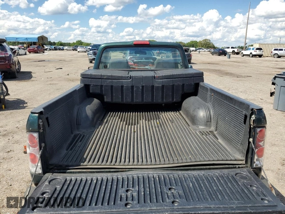 1999 Toyota Tacoma z VIN 4TANL42N5XZ453478, wystawiony jako Copart lot #56711635 z przebiegiem 197 412 mil mil oraz Szkoda całkowita • Salvage title. Historia ofert i sprzedaży dostępna na DreamBid. Obrazek 10.
