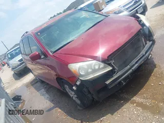 2006 Honda Odyssey EX-L with VIN 5FNRL38606B426919, listed as a IAAI auction lot 42077458 with 125,161 mi miles and . Bid and sale history available at carsss.com. Image 1.