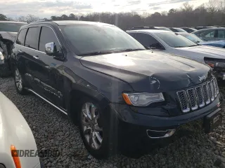2015 Jeep Grand Cherokee Summit with VIN 1C4RJFJG0FC700014, listed as a Copart auction lot 42981765 with 144,937 mi miles and Salvage Title. Bid and sale history available at DreamBid. Image 4.
