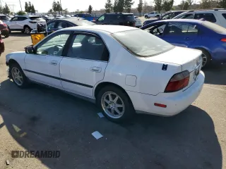 1997 Honda Accord LX with VIN 1HGCD5631VA187865, listed as a Copart auction lot 72278014 with 201,204 mi miles and Salvage Title. Bid and sale history available at carsss.com. Image 2.