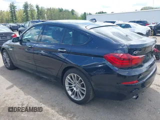 2014 BMW 5 Series 535i Gran Turismo xDrive with VIN WBA5M4C52ED183844, listed as a IAAI auction lot 42227214 with 104,098 mi miles and . Bid and sale history available at DreamBid. Image 3.