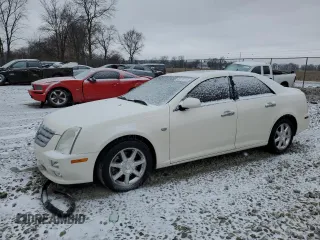 2005 Cadillac STS with VIN 1G6DW677050160850, listed as a Copart auction lot 45115715 with 114,059 mi miles and Salvage Title. Bid and sale history available at DreamBid. Image 1.
