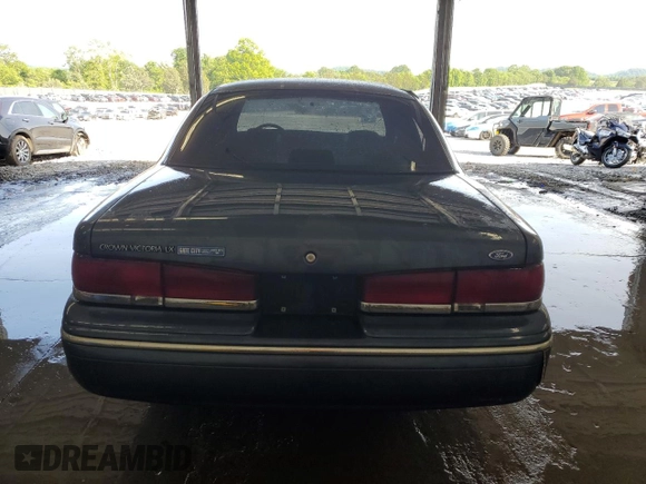 1997 Ford Crown Victoria LX с VIN 2FALP74W2VX109574, выставлен на аукционе Copart как лот 56222925 с пробегом 175 901 миль миль и Списание • Salvage title. История ставок и продаж доступна на DreamBid. Изображение 6.