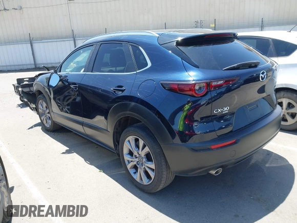 2023 Mazda CX-30 S Select with VIN 3MVDMBBM3PM514030, listed as a IAAI auction lot 42326959 with 41,226 mi miles and . Bid and sale history available at DreamBid. Image 3.