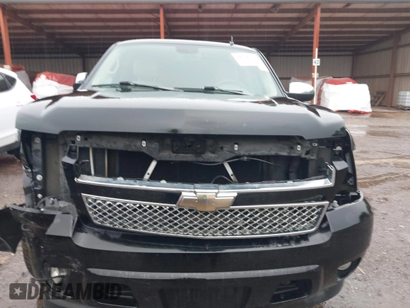 2009 Chevrolet Tahoe LTZ z VIN 1GNFC33J19R282480, wystawiony jako IAAI lot #41536774 z przebiegiem 118 831 mil mil oraz . Historia ofert i sprzedaży dostępna na DreamBid. Obrazek 12.