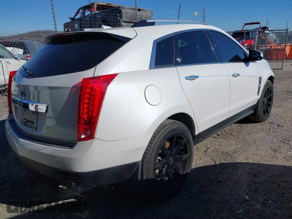 2011 Cadillac SRX Premium Collection with VIN 3GYFNCEY2BS624867, listed as a IAAI auction lot 41273945 with 209,296 mi miles. Bid and sale history available at carsss.com. Image 4.