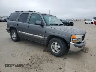 2002 GMC Yukon SLE z VIN 1GKEC13V52J192656, wystawiony jako Copart lot #46674605 z przebiegiem 258 336 mil mil oraz Szkoda całkowita • Salvage title. Historia ofert i sprzedaży dostępna na DreamBid. Obrazek 4.