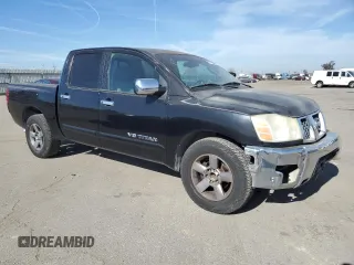 2005 Nissan Titan SE with VIN 1N6AA07A75N511728, listed as a Copart auction lot 42618055 with 113,210 mi miles and Salvage Title. Bid and sale history available at DreamBid. Image 4.