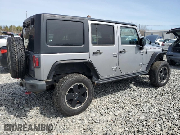 2015 Jeep Wrangler Unlimited Rubicon Hard Rock with VIN 1C4HJWFG4FL575054, listed as a Copart auction lot 51672655 with 130,405 mi miles and Clean title. Bid and sale history available at DreamBid. Image 3.