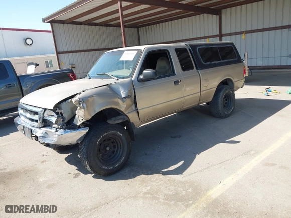 1999 Ford Ranger XL with VIN 1FTYR14X9XTA59675, listed as a IAAI auction lot 41861165 with 208,928 mi miles. Bid and sale history available at carsss.com. Image 2.