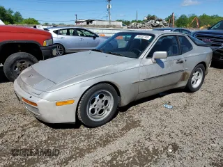 1986 Porsche 944 z VIN WP0AA0954GN155776, wystawiony jako Copart lot #56032785 z przebiegiem 17 696 mil mil oraz Szkoda całkowita • Salvage title. Historia ofert i sprzedaży dostępna na DreamBid. Obrazek 1.