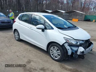 2016 Honda Fit LX with VIN JHMGK5H59GX007518, listed as a IAAI auction lot 41899665 with 68,188 mi miles. Bid and sale history available at carsss.com. Image 1.