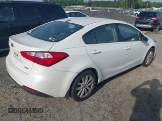 2014 Kia Forte LX with VIN KNAFX4A65E5204073, listed as a IAAI auction lot 42155914 with 167,079 mi miles and . Bid and sale history available at carsss.com. Image 4.
