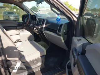 2018 Ford F-150 XL with VIN 1FTEW1EG1JFC31794, listed as a IAAI auction lot 41304111 with 129,058 mi miles and . Bid and sale history available at carsss.com. Image 5.