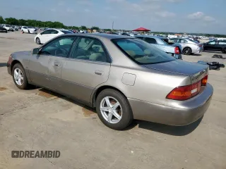 1999 Lexus ES 300 with VIN JT8BF28G6X5071297, listed as a Copart auction lot 54234895 with 223,870 mi miles and Clean title. Bid and sale history available at DreamBid. Image 2.