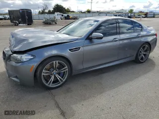 2014 BMW M5 with VIN WBSFV9C58ED097741, listed as a Copart auction lot 53825714 with 81,403 mi miles and Salvage Title. Bid and sale history available at carsss.com. Image 1.