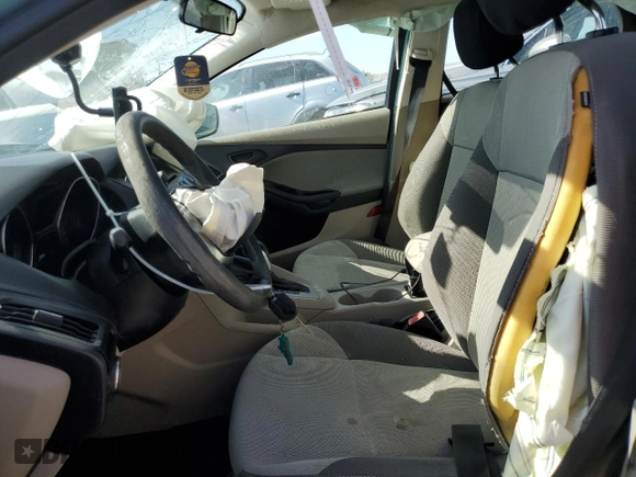 2012 Ford Focus SE with VIN 1FAHP3F24CL163896, listed as a Copart auction lot 61651015 with Not provided miles and Salvage title. Bid and sale history available at DreamBid. Image 7.