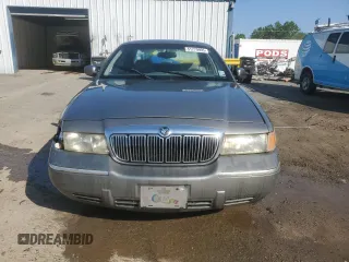 1999 Mercury Grand Marquis LS z VIN 2MEFM75W9XX687526, wystawiony jako Copart lot #51779995 z przebiegiem 196 466 mil mil oraz Szkoda całkowita • Salvage title. Historia ofert i sprzedaży dostępna na DreamBid. Obrazek 5.