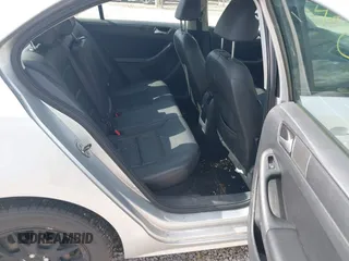 2014 Volkswagen Jetta SE z VIN 3VWD17AJ3EM246296, wystawiony jako IAAI lot #42163106 z przebiegiem 157 853 mil mil oraz . Historia ofert i sprzedaży dostępna na DreamBid. Obrazek 8.
