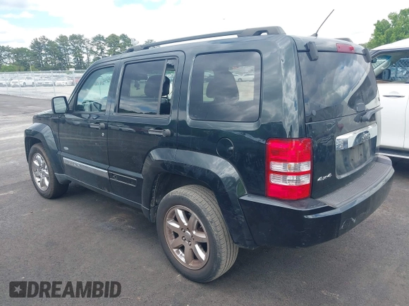 2012 Jeep Liberty Sport z VIN 1C4PJMAK4CW205955, wystawiony jako IAAI lot #42188882 z przebiegiem 196 411 mil mil oraz . Historia ofert i sprzedaży dostępna na DreamBid. Obrazek 3.