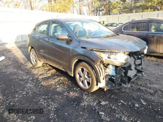 2021 Honda HR-V LX with VIN 3CZRU5H3XMM734410, listed as a IAAI auction lot 41441387 with 63,055 mi miles. Bid and sale history available at carsss.com. Image 1.