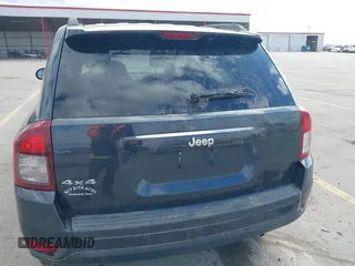 2015 Jeep Compass Sport with VIN 1C4NJDBBXFD151700, listed as a IAAI auction lot 41855482 with 124,822 mi miles. Bid and sale history available at carsss.com. Image 16.