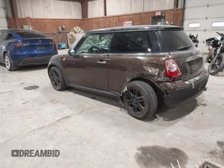 2012 MINI Hardtop with VIN WMWSU3C53CT260043, listed as a IAAI auction lot 41650247 with 180,711 mi miles and . Bid and sale history available at DreamBid. Image 3.